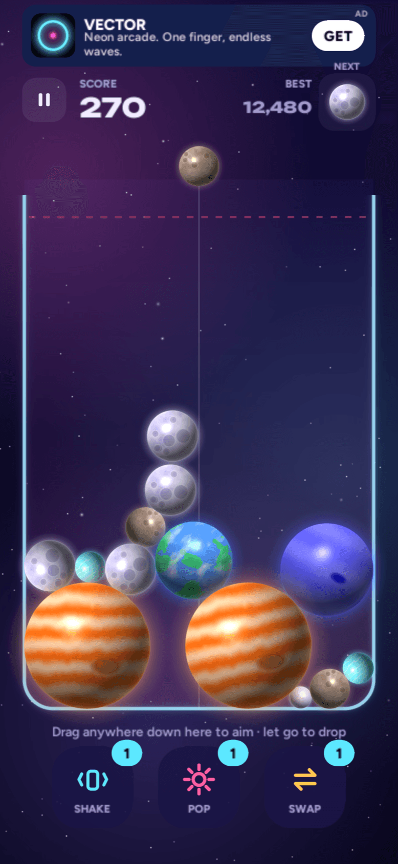A run in progress — Jupiters, an Earth, Neptune and moons stacked in a glowing jar below the dashed danger line, with Shake, Pop and Swap underneath.